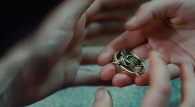 pin-hands LeakyNews.com The Hunger Games